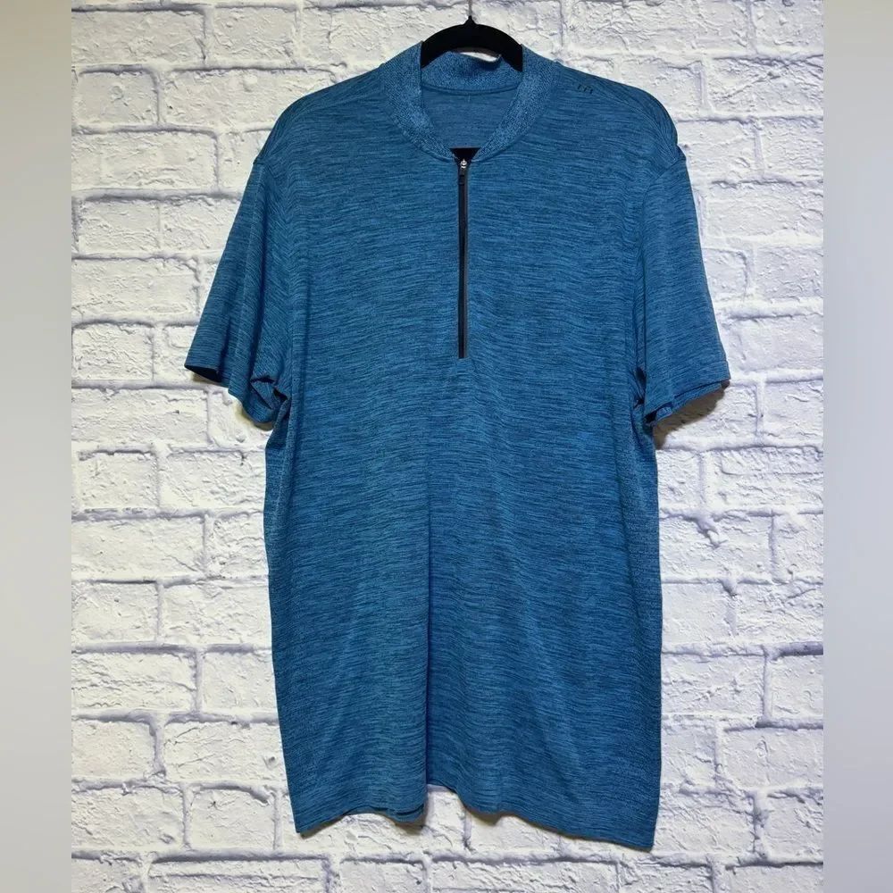 Lululemon Metal Vent Tech Surge Short Sleeve 1/2 Zip
True Navy / Neo Blue XL
